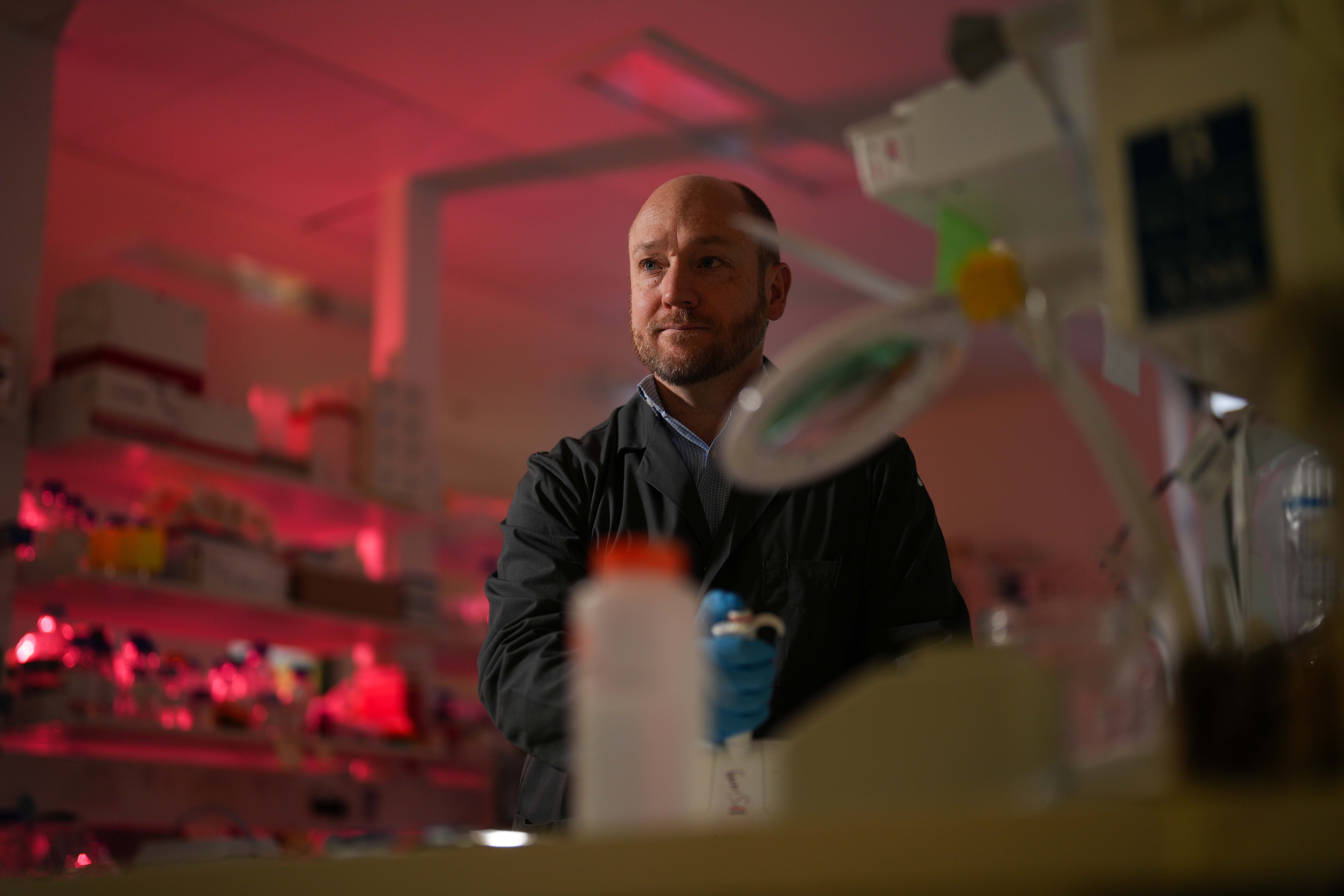Dr Tom Lea-Henry in a lab at JCSMR.
