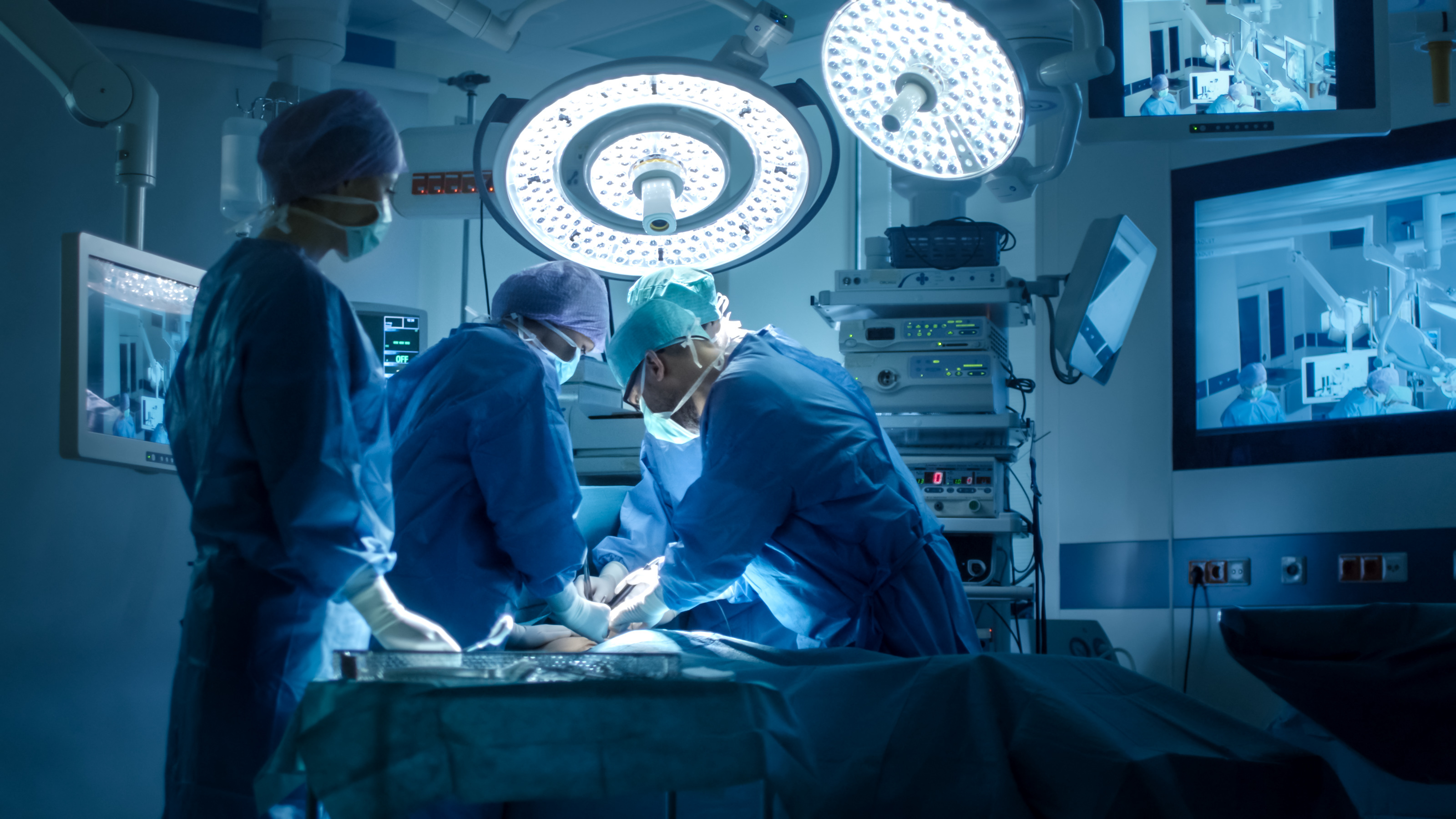 Doctors in surgery in close proximity