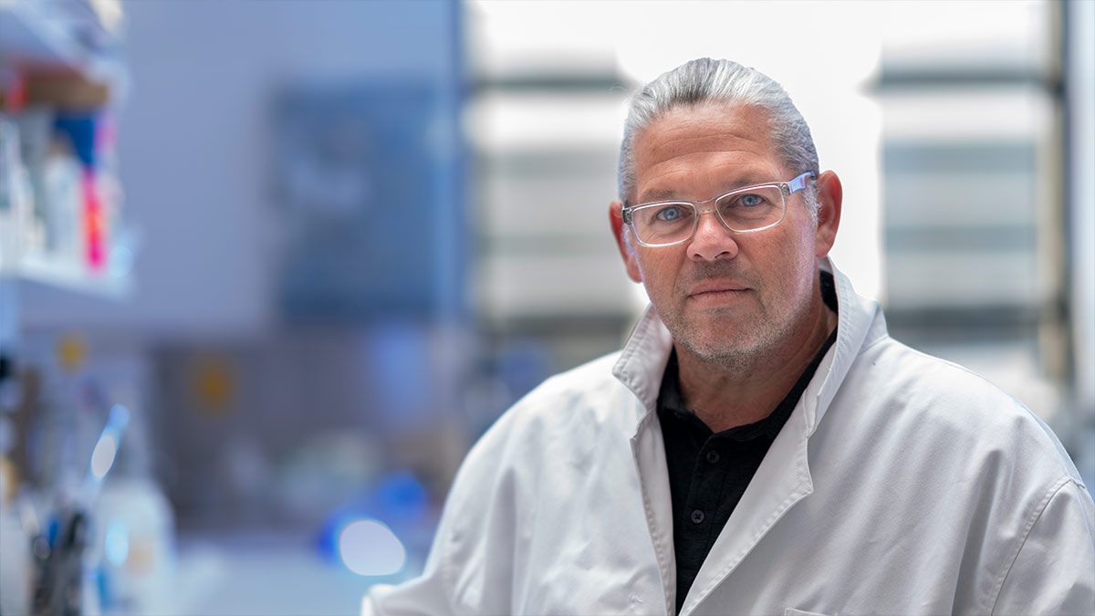 ANU Professor in Indigenous Genomics, Alex Brown, in the lab