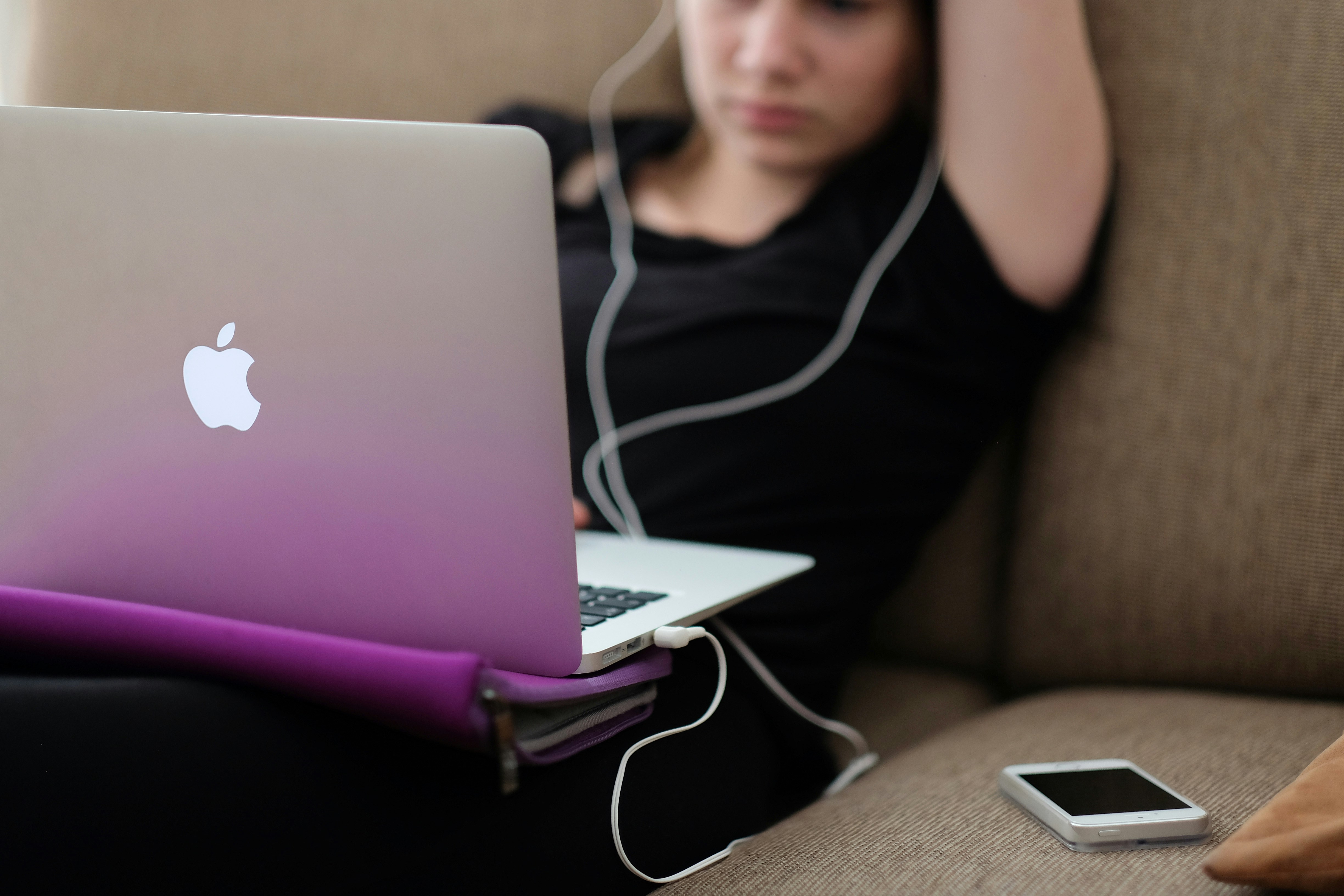 graphic of person sitting at a computer with title for uni virtual clinic