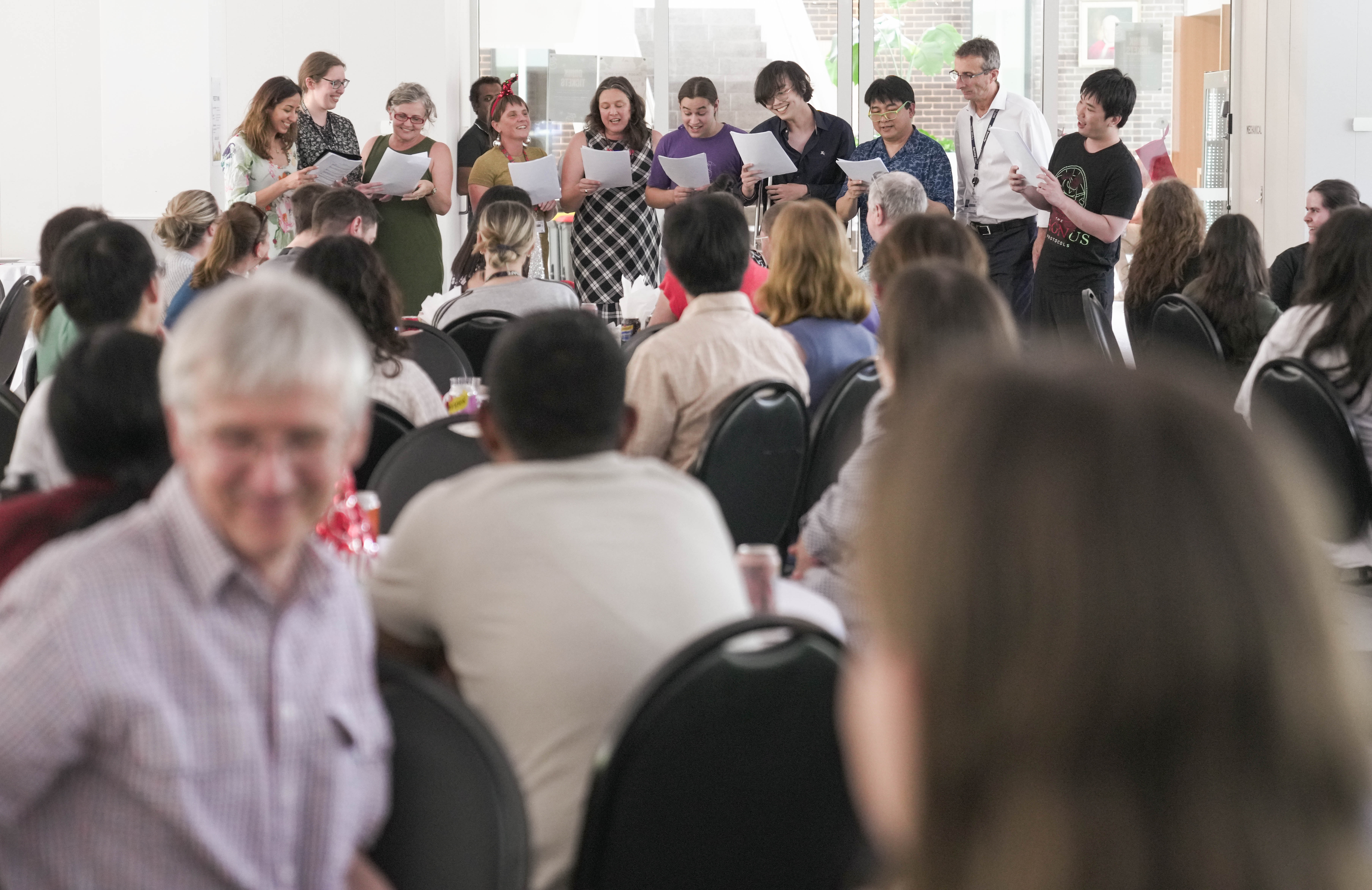 The John Curtin School of Medical Research choir perform at an end of year event at ANU in Canberra. (Tracey Nearmy/ANU) The JCSMR choir perform at an end of year event at ANU in Canberra.