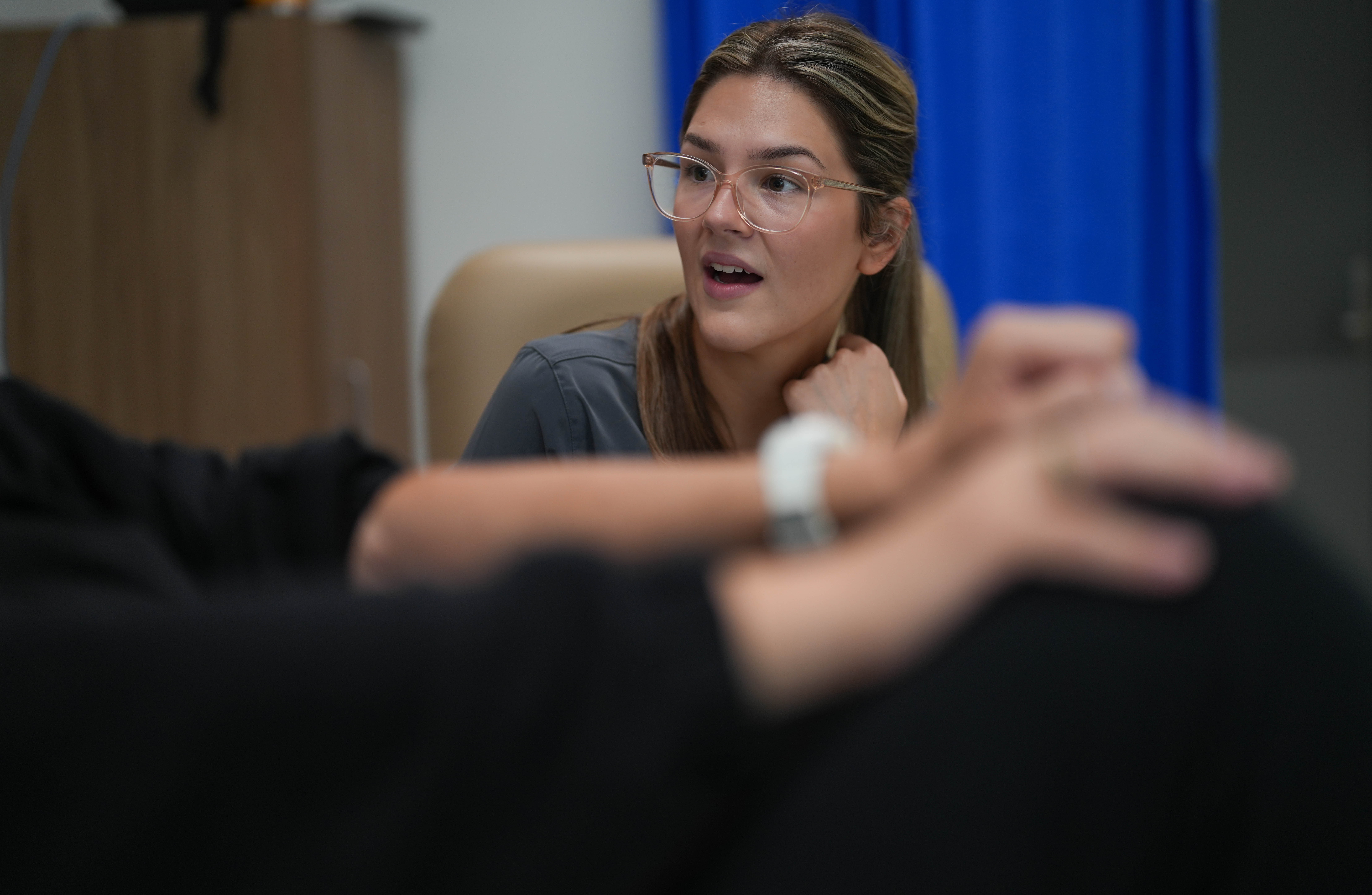 Dharawal woman, Jessica King Scholarship recipent and ANU final year medical student Taylor Glover poses for photographs with a patient at the Goulburn Base Hospital in Goulburn. Picture: Tracey Nearmy/ANU Taylor Glover talks to a patient at Goulburn Hospital.