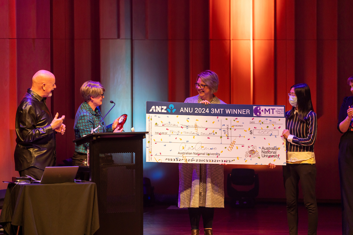The winner of the ANU 3MT competition takes home $4000. Photo: Jamie Kidston/ANU Winner of 3MT receives cheque