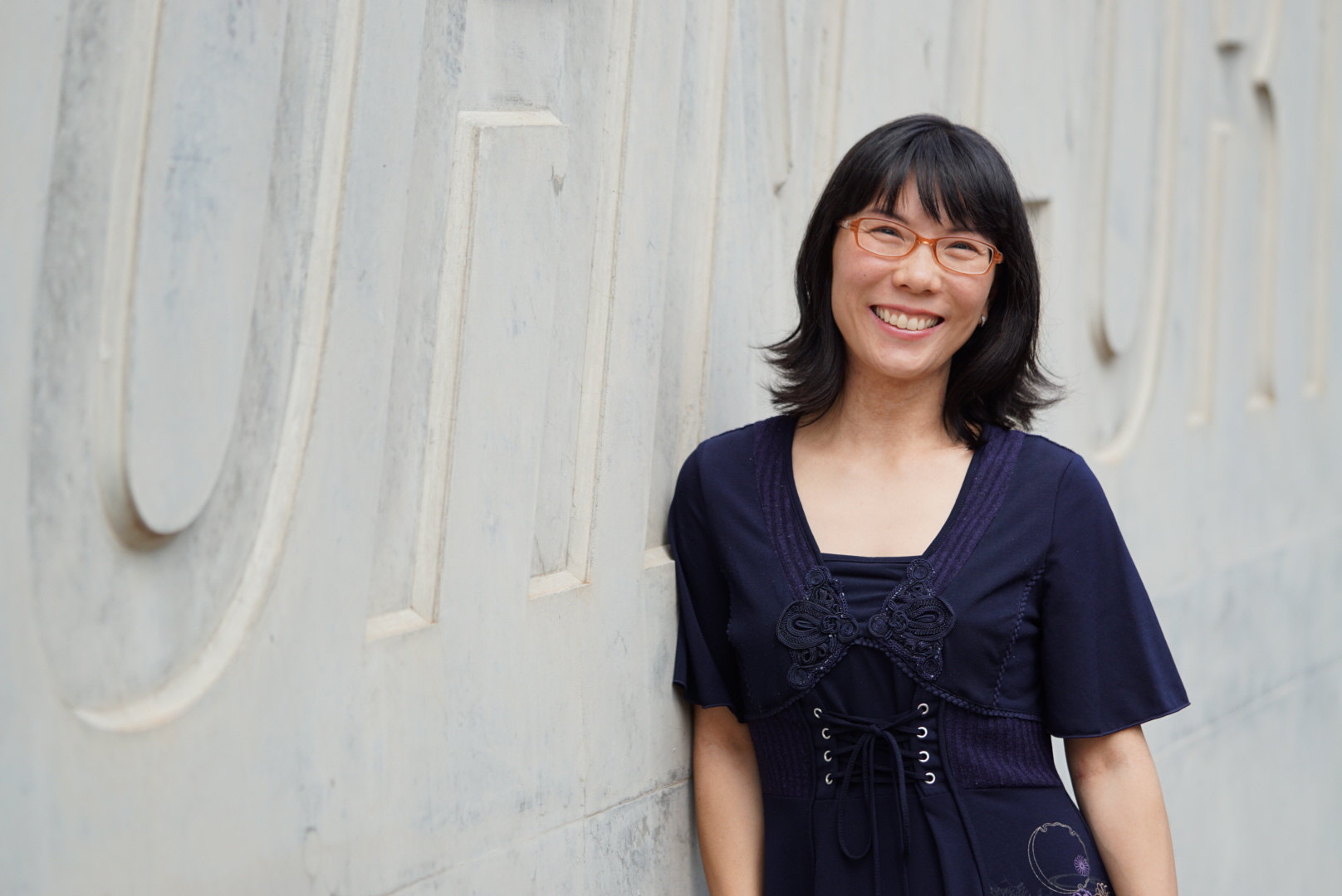 A woman looking at camera smiling