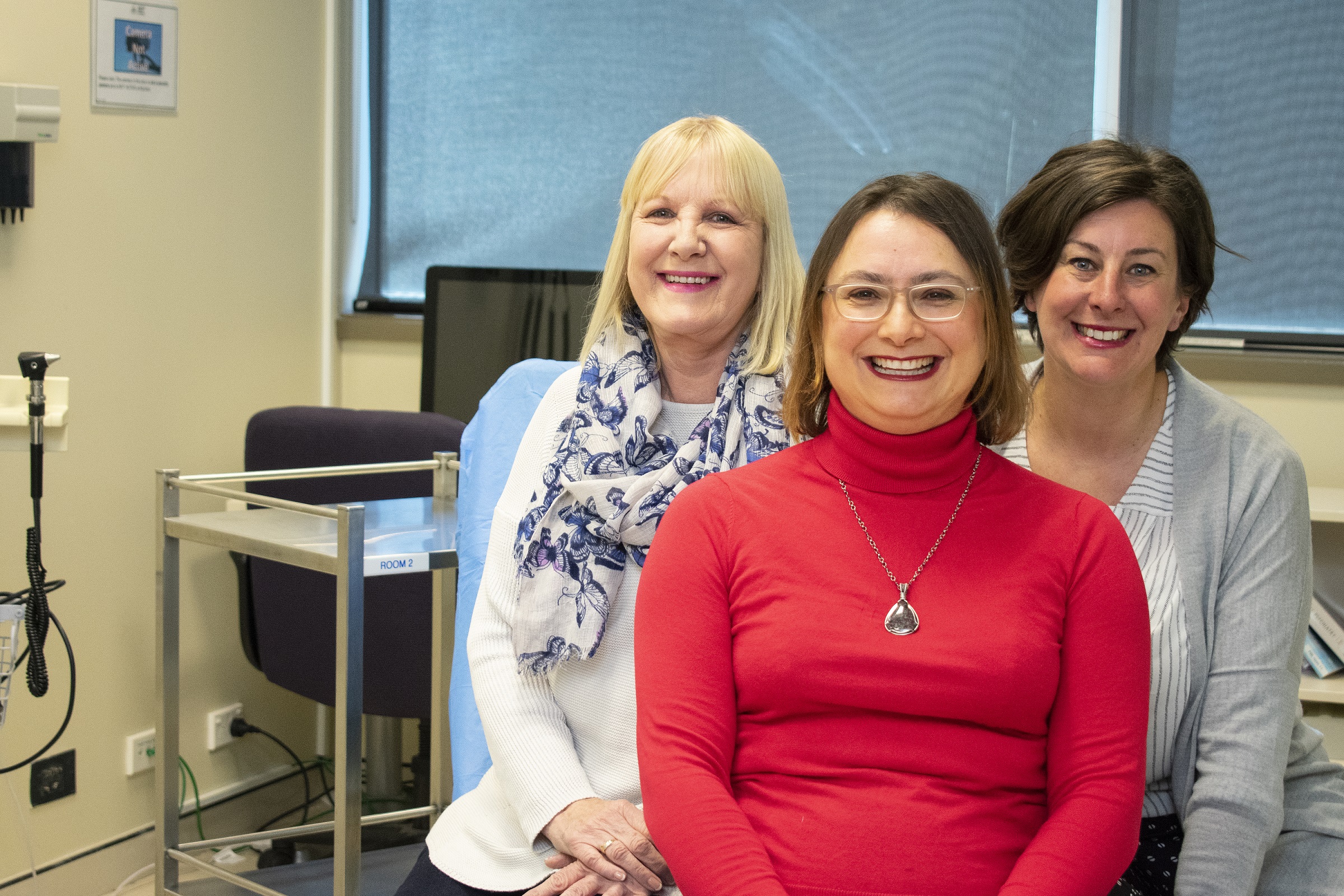 3 women smiling