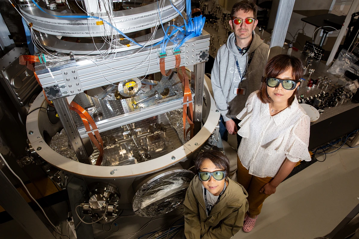 Photo: ANU Physics Physicists in lab wearing PPE