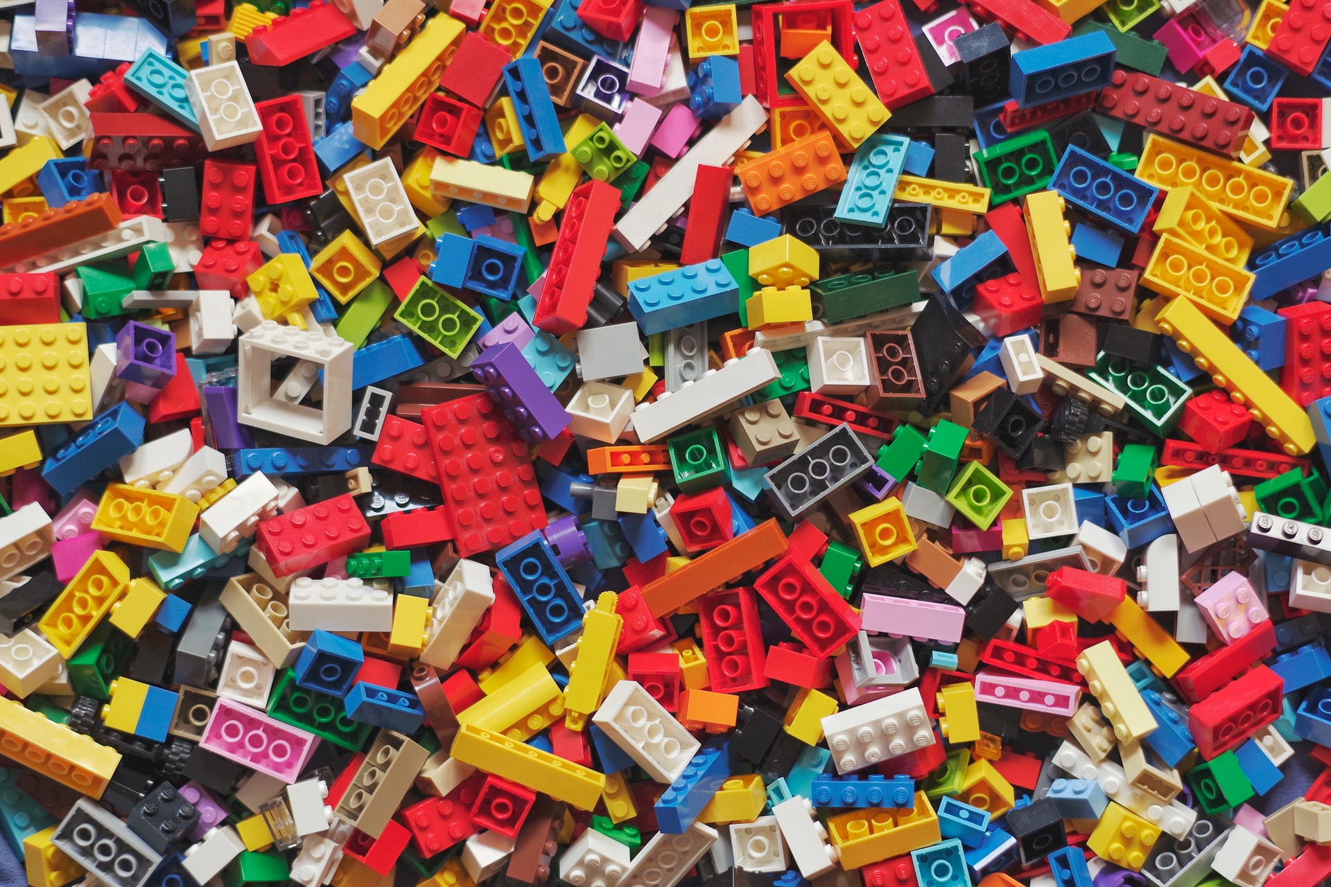 A close-up of scattered, colorful Lego bricks.