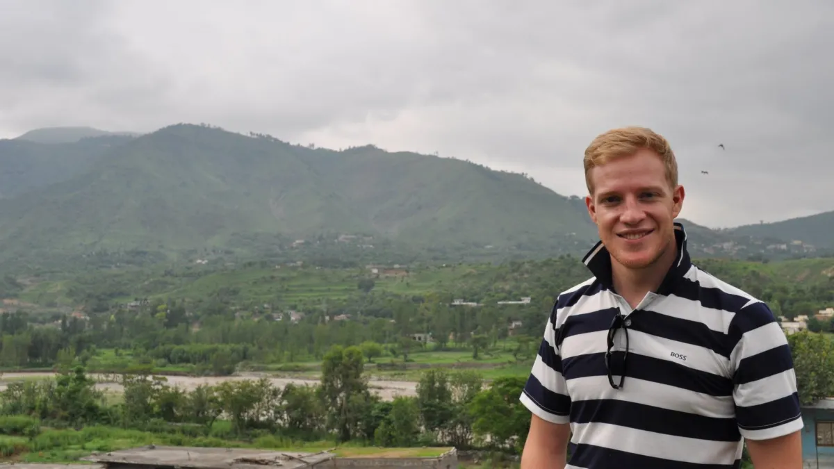 A man smiling at the camera