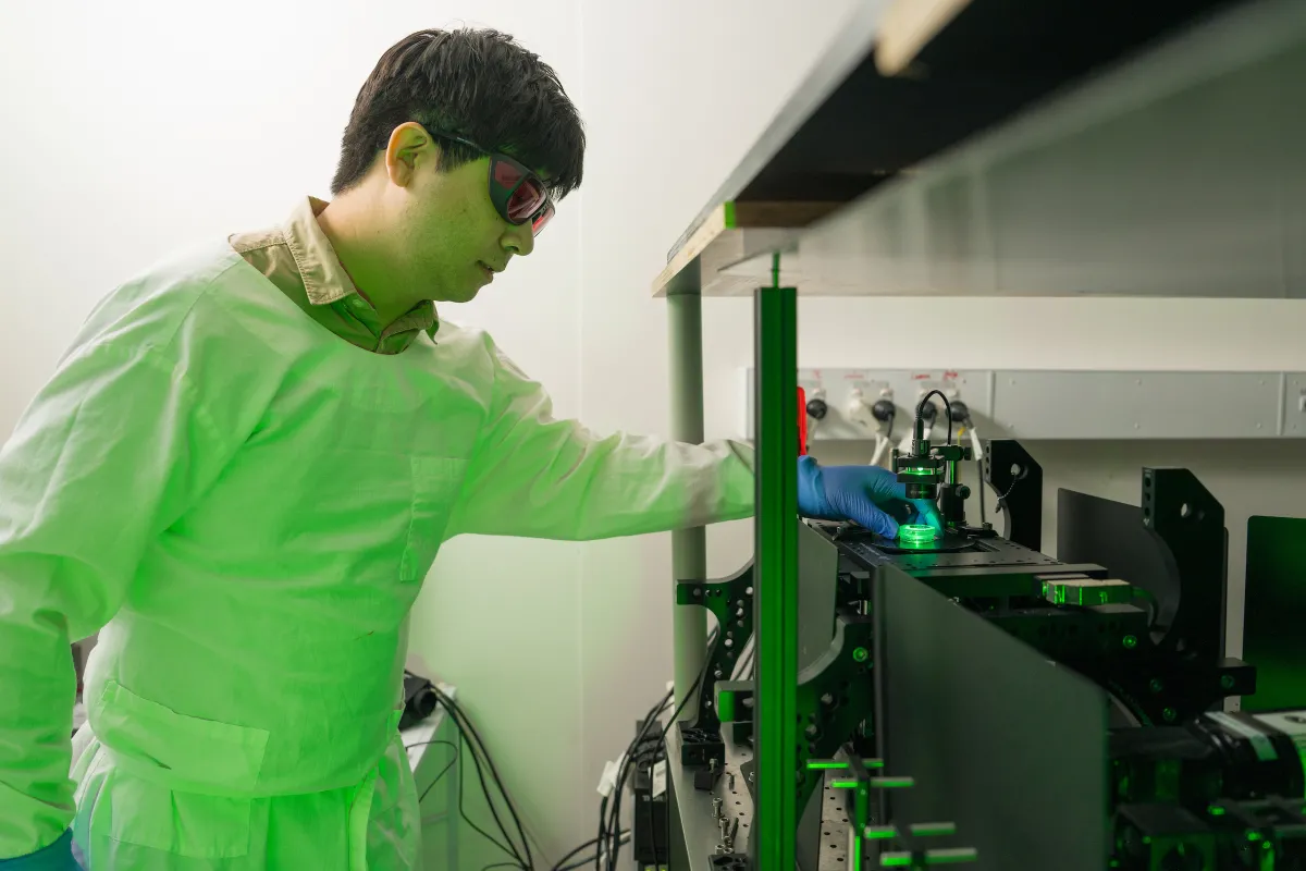 Dr Daniel Lim is adjusting a sample being viewed by the nanoscope technology