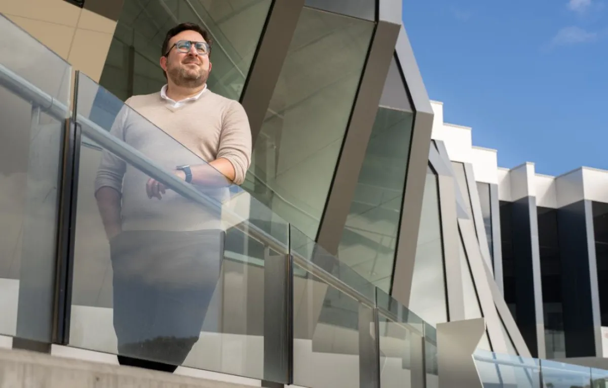 Man in front of a building