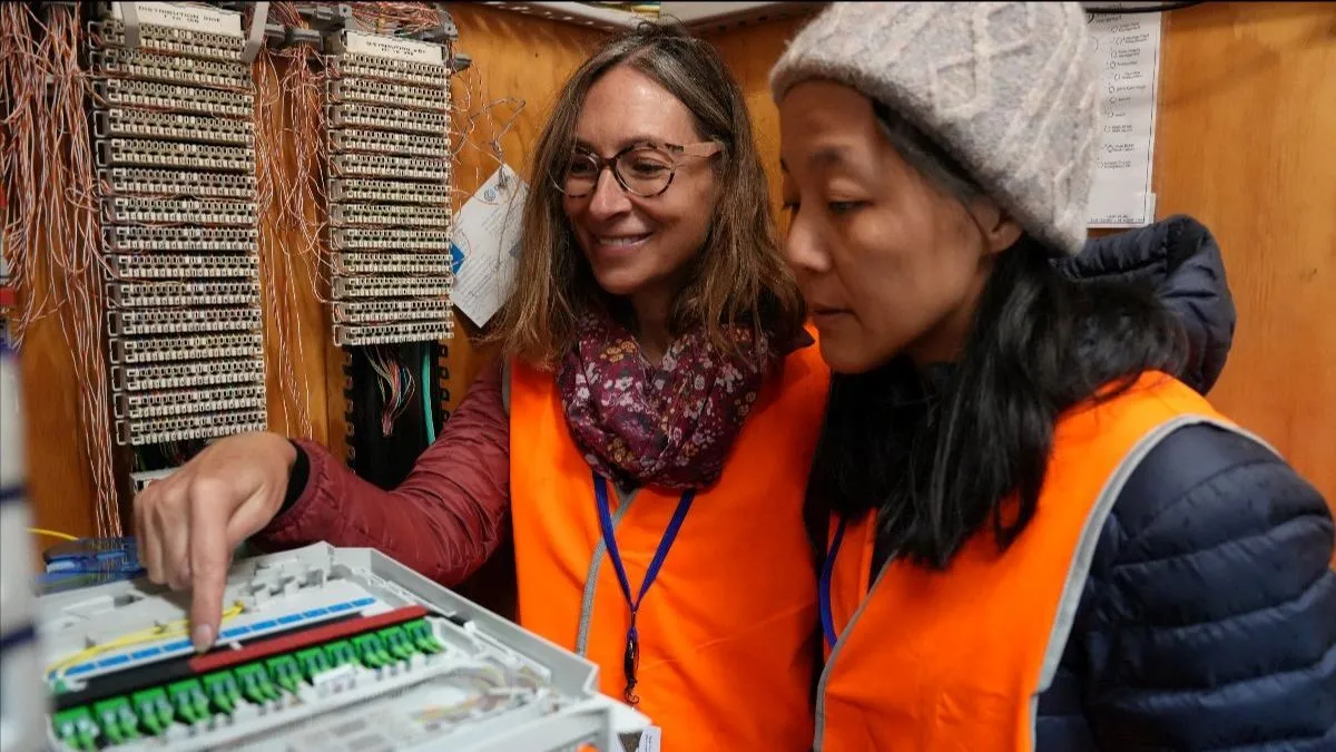 Two scientists using equipment