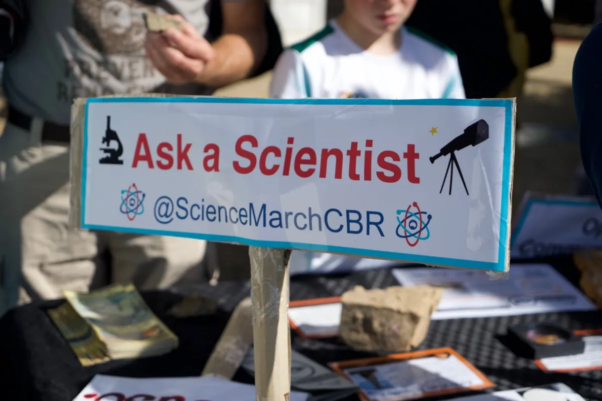 'Ask a Scientist' sign picket at the march for science in Canberra