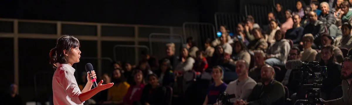 Speaker at three minute thesis