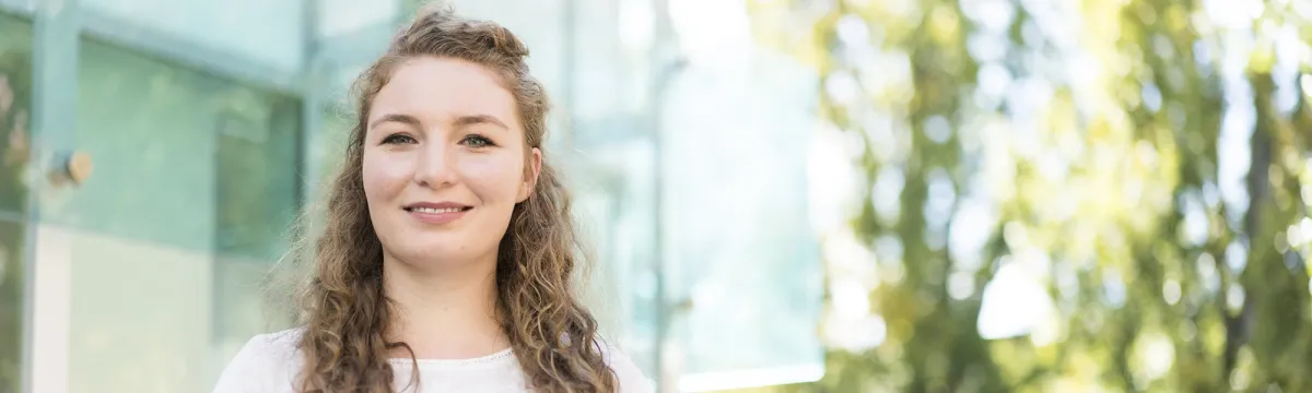 Student holding psychology book