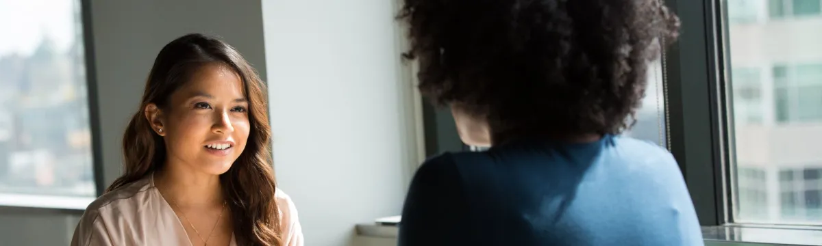 Woman's hand pressed against a window