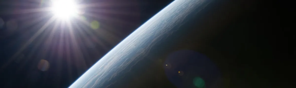 Image of the Earth and sun from the International Space Station.