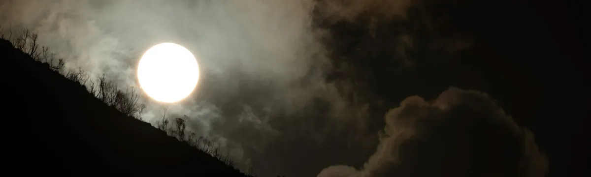 Sunrise behind bushfire haze