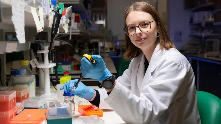Dr Samantha McGaughey in a lab