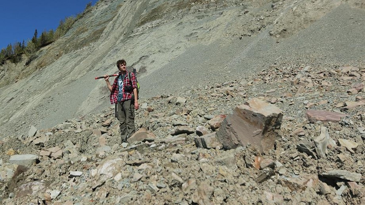 ANU researcher Ilya Bobrovskiy searches for fossils in the Zimnie Gory locality, Russia