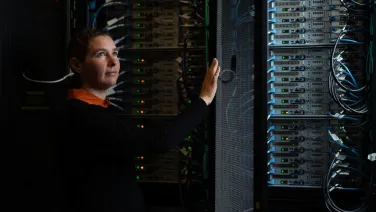 A woman with computer server