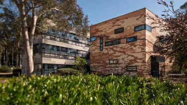Building with garden in foreground.