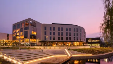 Kambri university precinct at night with lights.