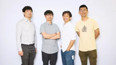 Four men against a plain white background