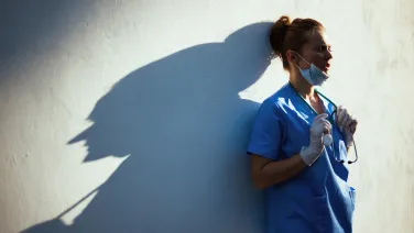 Doctor alone and looking into the distance