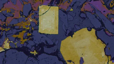 Crystals of pyrite and chalcopyrite in a section of copper ore