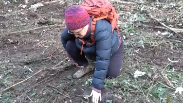 Woman with hands on a dead glider