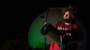 An astronomer and a telescope